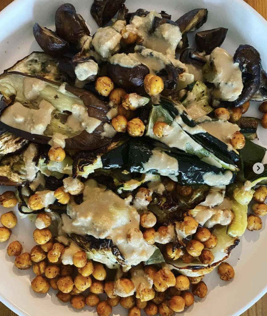 Lemon Tahini Cashew Sauce on roasted chickpeas, eggplant, and cabbage